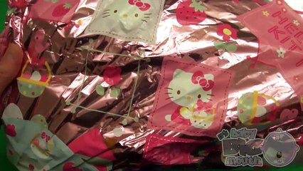 Opening a HUGE GIANT JUMBO SUPER Hello Kitty Surprise Egg!