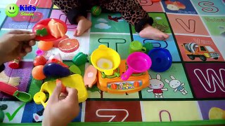 Cute kid plays cutting fruits and vegetable Cooking toys for kids Kids studio