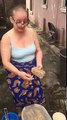 Oyinbo woman Grinds pepper with native grinding stone Calls out all nowadays ladies who use electric blinder