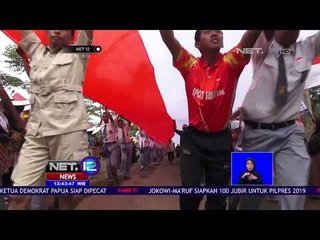 Kirab Bendera Merah Putih Raksasa Diikuti Warga dan Siswa - NET 12
