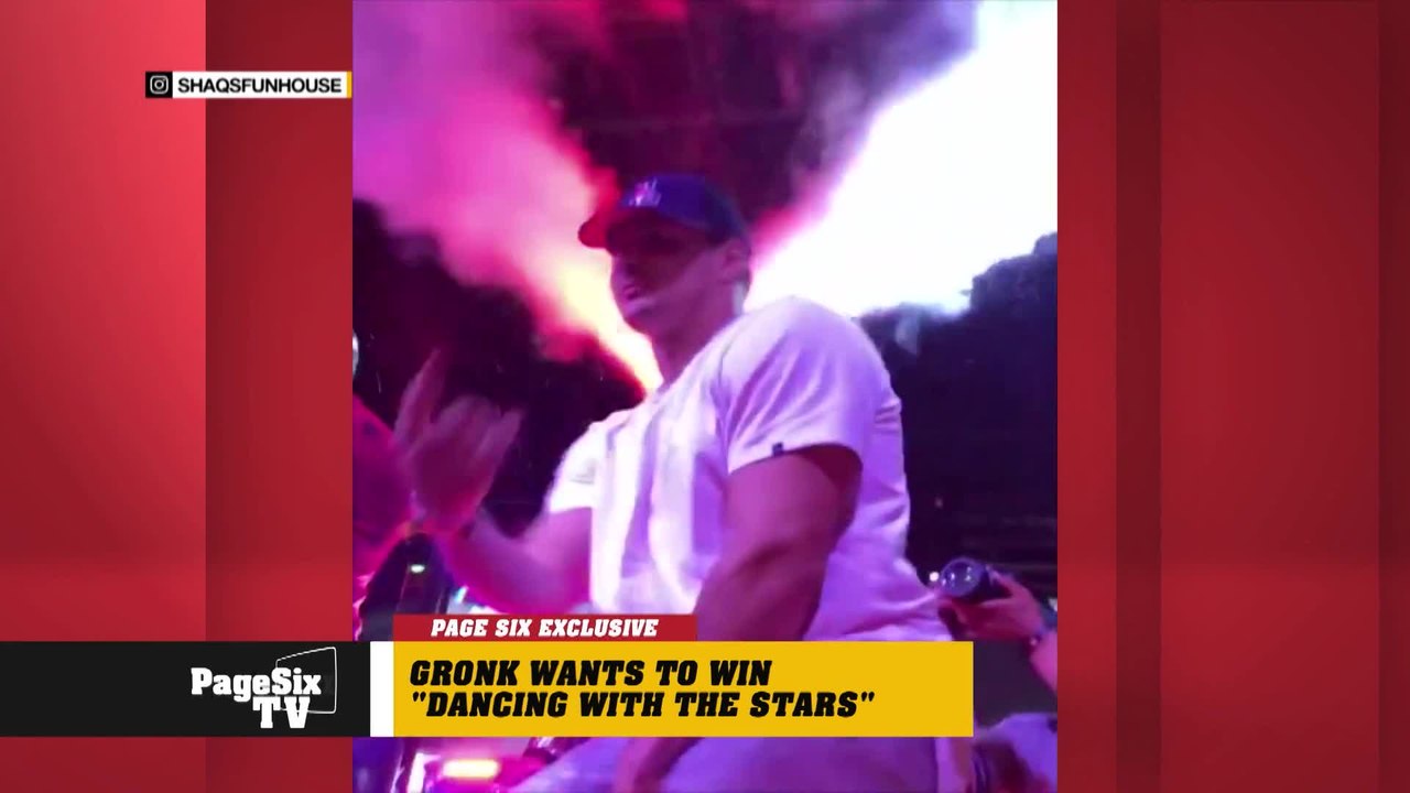 EXCLUSIVE: It's 13-feet of fun! NFL star @RobGronkowski and @SHAQ squared off in a dance off in Miami. The Patriots tight end took it a two-step further, claiming that he wants to win #DWTS someday. But we cry foul! Get jiggy with the details on today's #