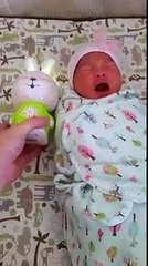 Calming a Crying Newborn Baby with a Bunny