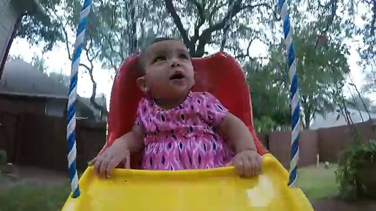 Baby Swinging On Fisher Price Swing