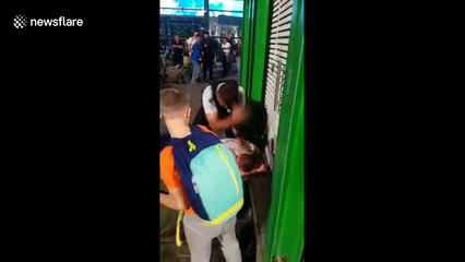 Video of police officer beating man in front of his family sparks outrage in Russia