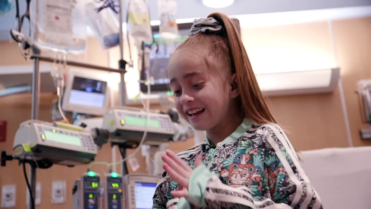 Drake surprises 11-year-old fan in Chicago hospital