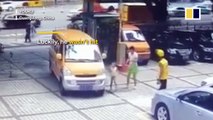 Mother tries pushing son towards van