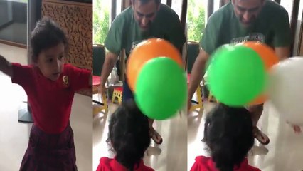 Ziva Dhoni's Cute Balloon fight with Papa Ms Dhoni goes Viral, Watch Video | FilmiBeat