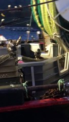 Eagles Surround Fishing Trawler for a Feed