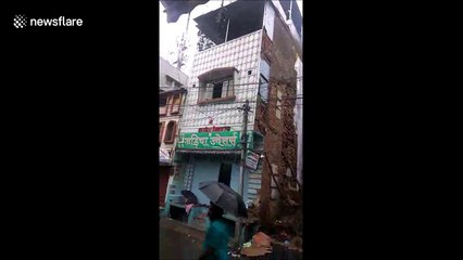 Video shows moment house crumbles to ground in India village after heavy downpour