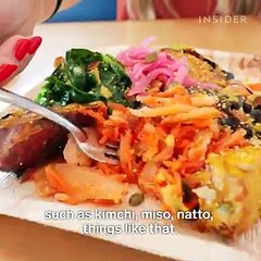 These chefs climb onto a table to make 50 pounds of kimchi