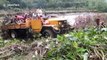 Truck carries dozens of villagers through swollen river after heavy rain