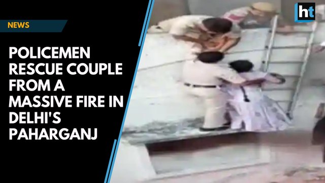 Watch: Policemen rescue couple from a massive fire in Delhi's Paharganj