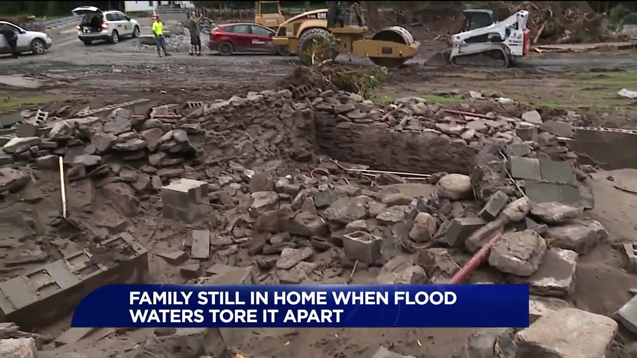 Family Rescued After Home Flood Waters Swept Home Off Foundation