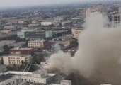 Downtown Los Angeles Fire Sends Smoke Stream into Morning Sky