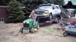 John Deere lawn tror pulls F350 Dually