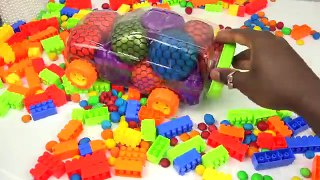 Learn Colors Squishy Balls Car Candy M&Ms And Lego Blocks Glitter Squishy Balls