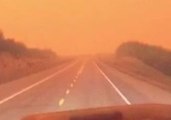 Truckers Drive Through Smoke Near Wildfire in Rural British Columbia
