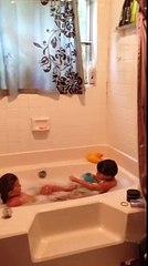 Big brother caught taking care of his baby sister