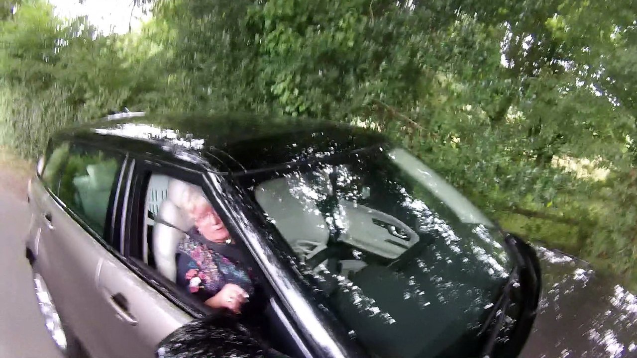 Confrontation Between Cyclists and Driver
