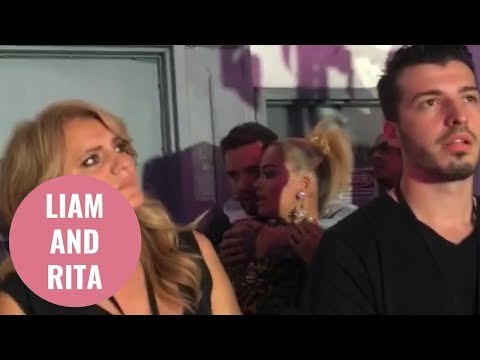 Liam Payne and Rita Ora filmed dancing intimately and hugging behind the scenes at concert