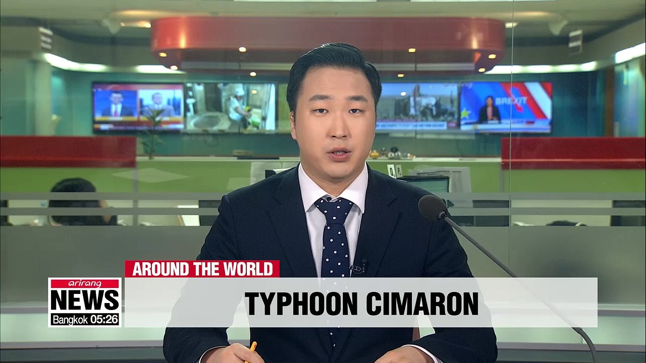 Typhoon Cimaron pounds western Japan with torrential rain, damaging winds