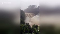 Hurricane Lane turns waterfall into raging cascade of floodwaters