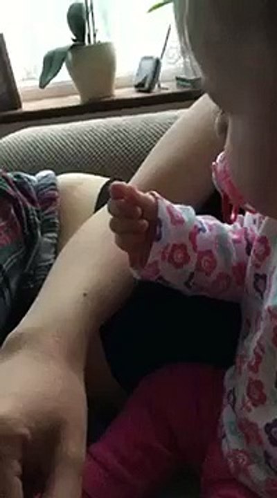 baby tries to eat mum s beauty spot