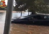 Italian Police Rescue Family From Car Trapped in Floodwater in Taranto