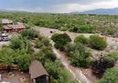 Drone Footage Shows Stranded Vehicle in Tucson Floodwater
