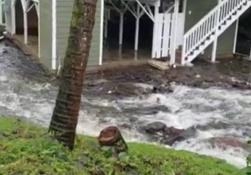 Residents Endure Flooding in Hilo, Hawaii, Amid Hurricane Lane