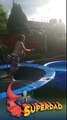 dad hits his leg on the trampoline as he tries to jump into the swimming pool