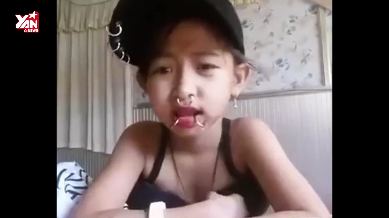 Bé gái lớp 5 xỏ khuyên đầy mặt, hát rap chửi thề - Video Dailymotion