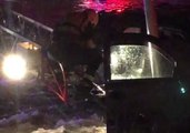 Tucson Firefighters Use Ladder to Rescue Pair Trapped in SUV