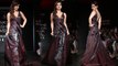 Lakme Fashion Week: Neha Sharma looks gorgeous in Maroon Cocktail Gown; Watch Video | Boldsky