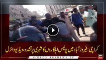 Police officer along with his guards beats a citizen in Karachi