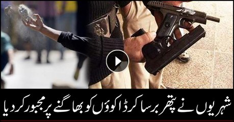 Robbers forced to flee after being pelted with stones