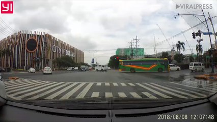 Fast food delivery rider jumps red light and gets hit by car