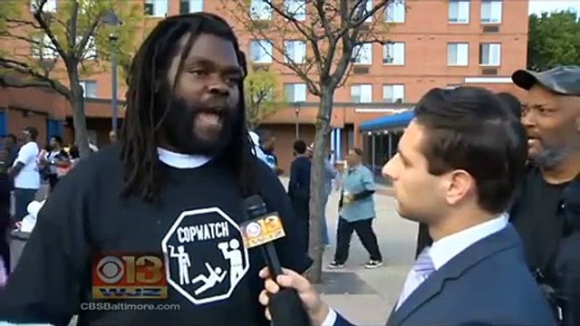 NEIGHBORHOOD REJOICING AFTER OFFICERS FACE CHARGES IN FREDDIE GRAY DEATH