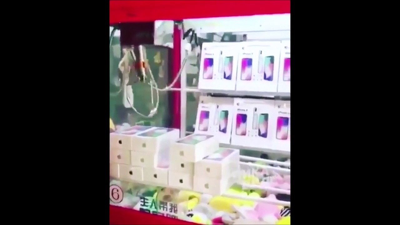 Comment gagner 12 iPhones aux pinces à la fête foraine