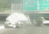 Tractor Trailer Carrying a Load of Candy Takes a Spill