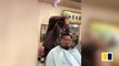 Chinese barber uses angle grinder to cut hair