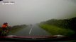 Watch moment chopper almost grazes hillside road in foggy conditions