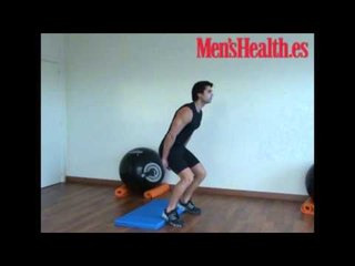 Sentadilla con barra por detrás