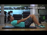 Abdominales: Flexión de tronco apretando muslos