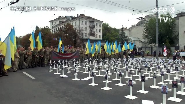 Ukraine marks 2014 battlefield massacre it blames on Russia