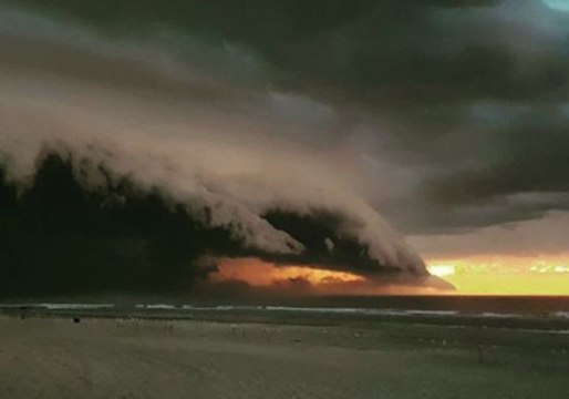 Lightning Flashes and Storm Cloud Combine to Create Ominous Scene Off French Coast