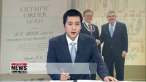 Pres. Moon given IOC's highest award for successfully hosting PyeongChang Winter Olympics