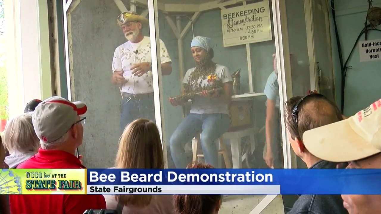 Woman wears thousands of bees on her face