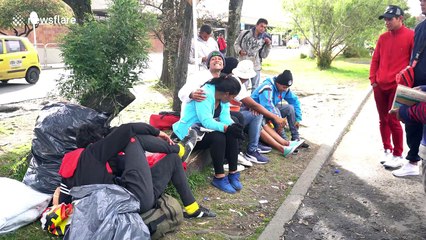 Scores of Venezuelans wander in the streets of Colombia’s capital