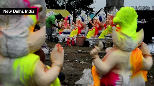 Indian artists decorate statues of Hindu deity Lord Ganesha